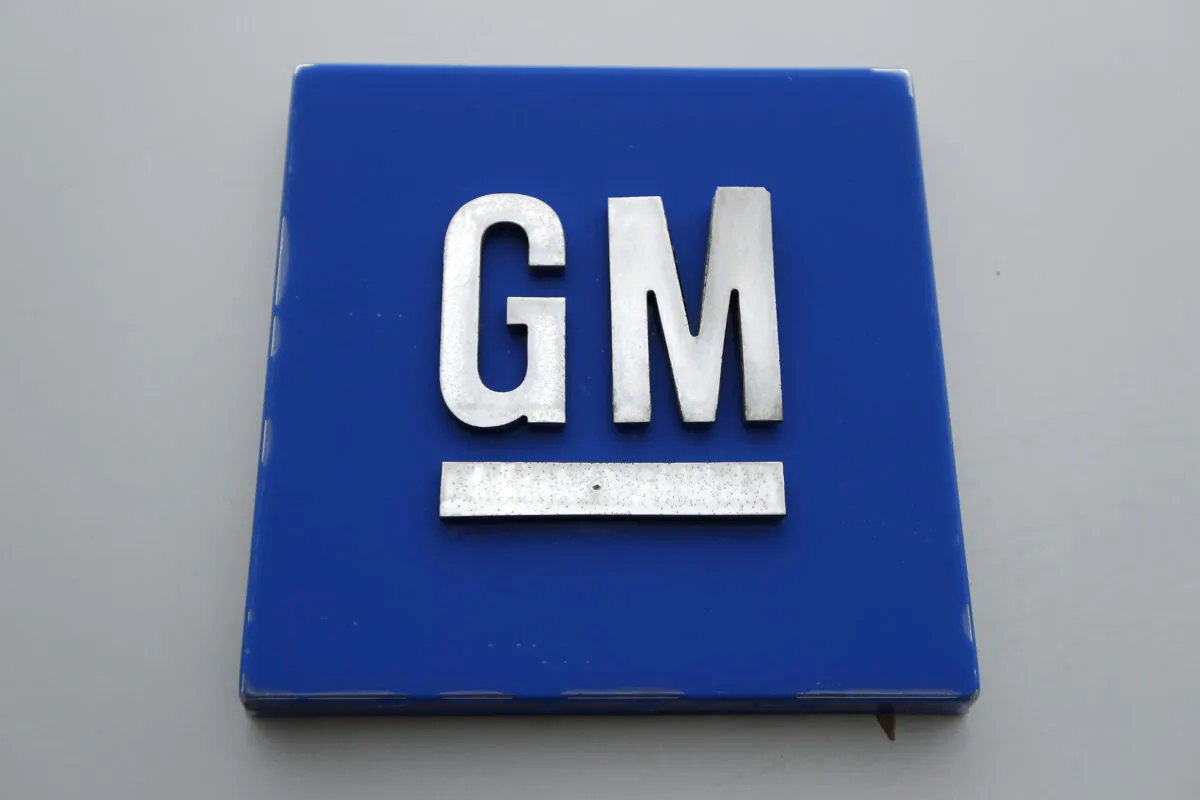 The General Motors logo is displayed outside the General Motors Detroit-Hamtramck Assembly plant, in Hamtramck, Michigan, on Jan. 27, 2020. (Paul Sancya/AP Photo)