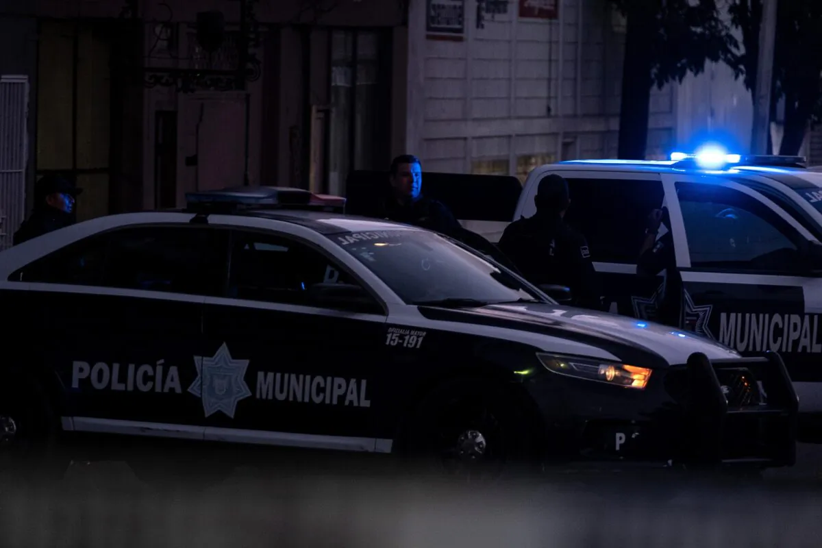 Police officers guard a crime scene in Tijuana, Mexico, on April 21, 2019. (Guillermo Arias/AFP via Getty Images)