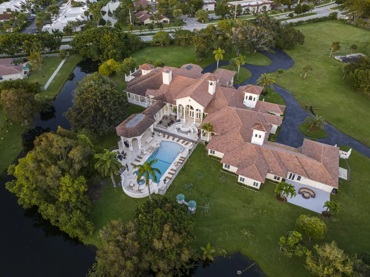 The sprawling home is located on one of Weston’s largest lots and is buffered by waterways, with plenty of room for even the largest family and many guests. (Courtesy of The Carroll Group)