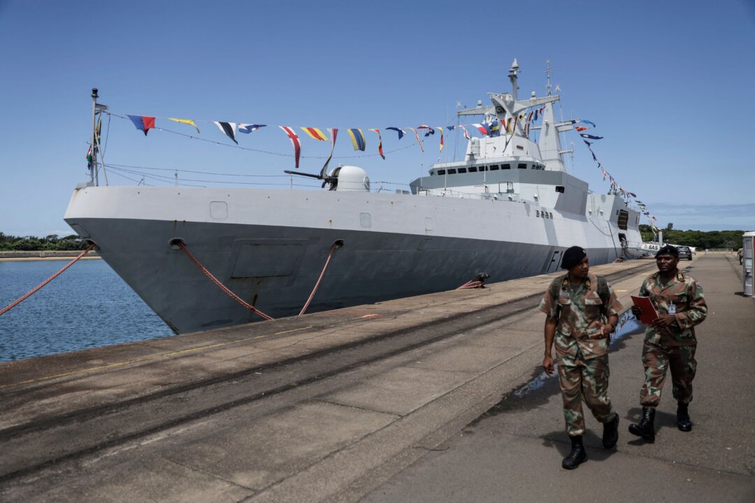 South African National Defence Force (SANDF) soldiers walk past the South African military frigate "SAS Mendi" docked at the port in Richards Bay on Feb. 22, 2023. On Feb. 17, 2023, South Africa embarked on a 10-day joint military exercise with Russia and China.
The controversial drills, dubbed "Mosi," meaning "smoke" in the local Tswana language, are taking place off the port cities of Durban and Richards Bay. (Photo by Guillem Sartorio/ AFP) (Photo by Guillem Sartorio/AFP via Getty Images)