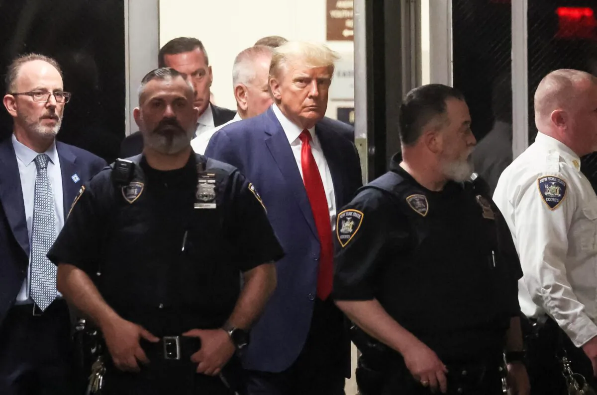 Former President Donald Trump arrives at Manhattan Criminal Courthouse on April 4, 2023. (Brendan McDermid/Reuters)