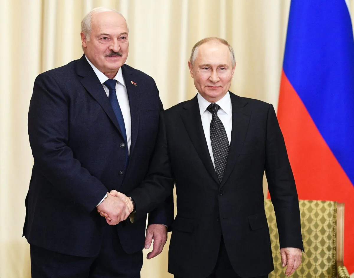 Russian President Vladimir Putin (R) meets with his Belarusian counterpart Alexander Lukashenko at the Novo-Ogaryovo state residence, outside Moscow, on Feb. 17, 2023. (Photo by Vladimir Astapkovich / SPUTNIK / AFP) (Photo by VLADIMIR ASTAPKOVICH/SPUTNIK/AFP via Getty Images)
