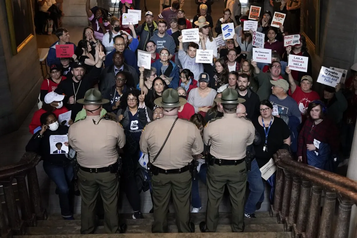 Tennessee State Troopers block the stairwell leading to the legislative chambers of the state's House of Representatives in Nashville, Tenn., on April 6, 2023. (George Walker IV/AP Photo)
