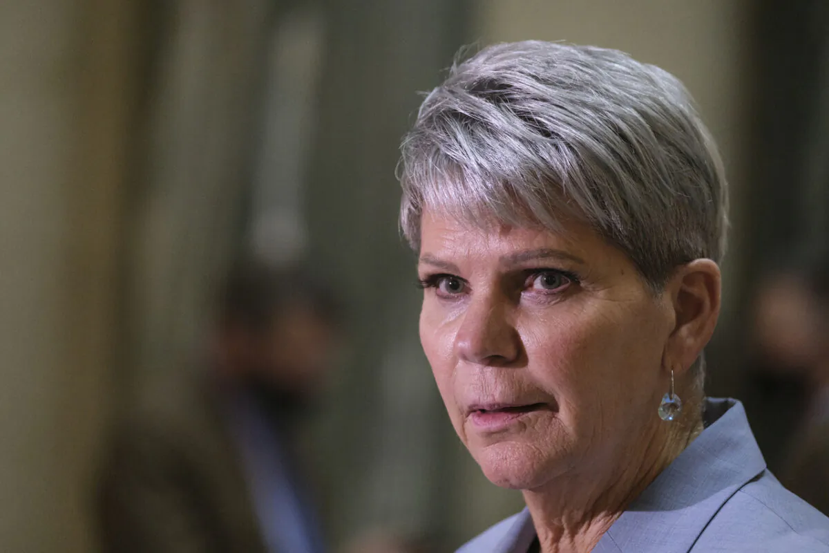 Minister of Corrections, Policing and Public Safety Christine Tell speaks to the media in Regina on Oct. 27, 2021. (Michael Bell/The Canadian Press)