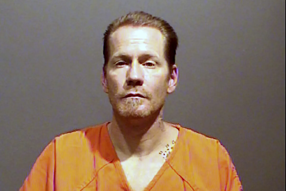 This photo provided by the Aurora Police Department shows Haskel Leroy Crawford, 38,. Haskel  was arrested Thursday, April 6, 2023, on one charge of first-degree murder. Police in Colorado on Thursday continued to dig out a body encased in concrete that was found in a condo crawl space they believe is of a man killed by Crawford and alleged partner in crime during a fight last year. (Aurora Police Department via AP)