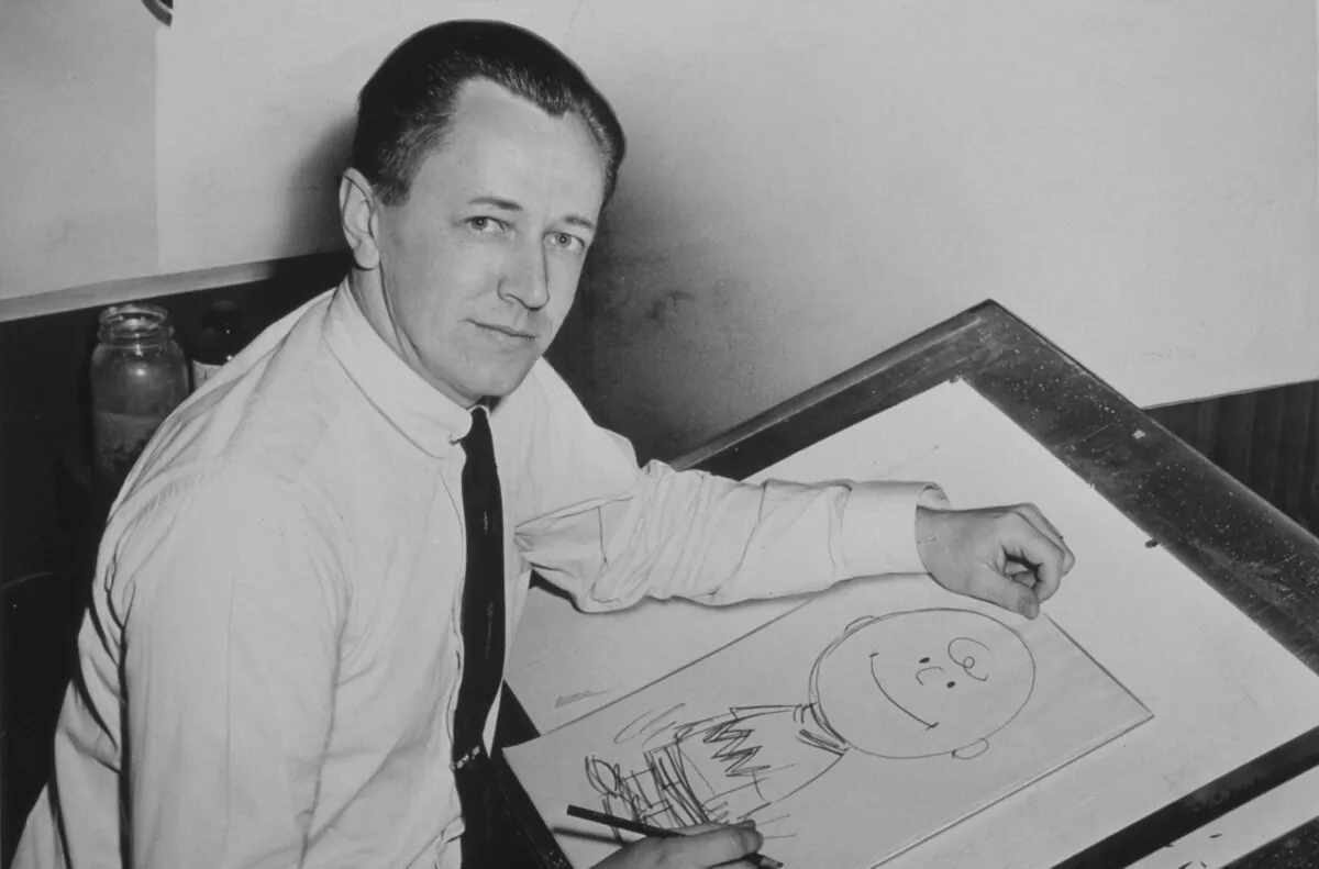 American cartoonist Charles Schulz was known
worldwide for his “Peanuts” comic strip. At his drawing
desk in 1956, Schulz is pictured sketching the famous
character Charlie Brown. (Library of Congress)