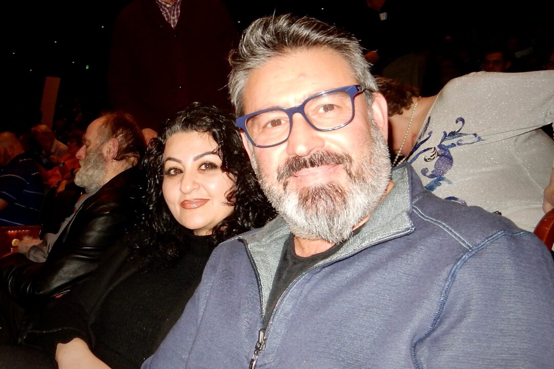 Reza Nour and his wife at the Shen Yun Performing Arts performance at Marion Oliver McCaw Hall in Seattle on April 6, 2023. (Frank Zhang/The Epoch Times)
