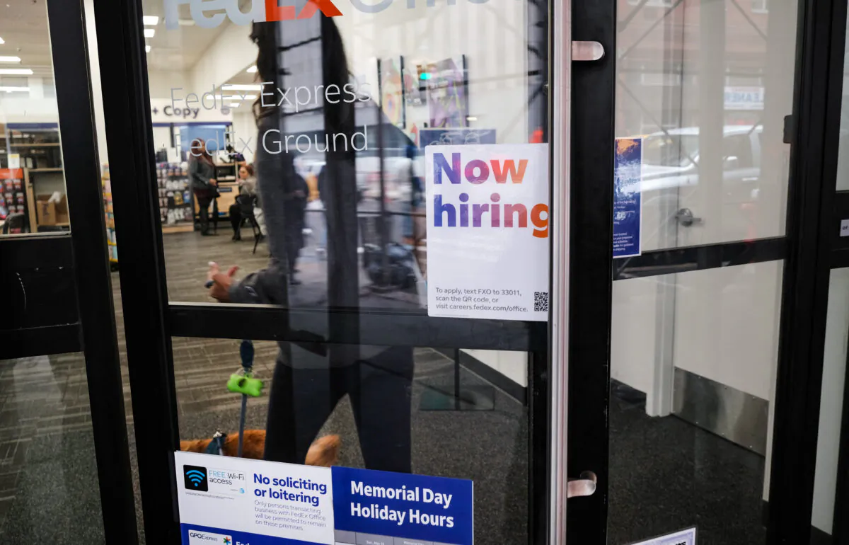 A 'now hiring' sign in a Manhattan store in New York on May 6, 2022. (Spencer Platt/Getty Images)