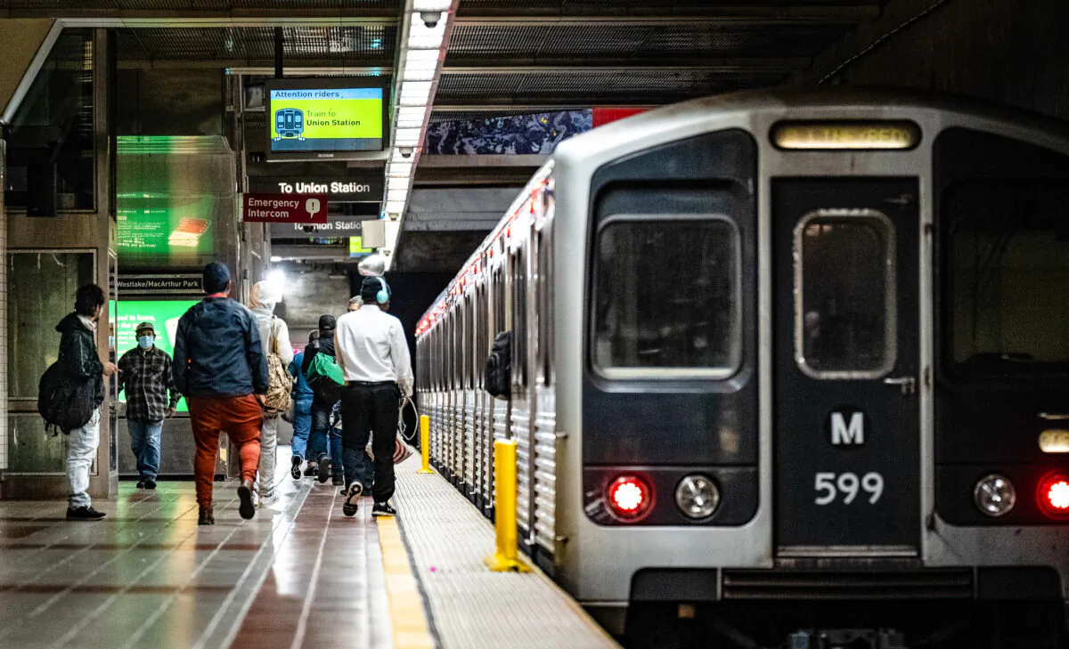 Passengers use LA Metro's Westlake/MacArthur Park station in Los Angeles on March 20, 2023. (John Fredricks/The Epoch Times)