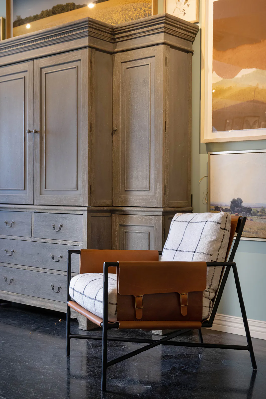 With its metal frame, sharp angles and pop of leather, this chair is the star of the show. (Handout/TNS)