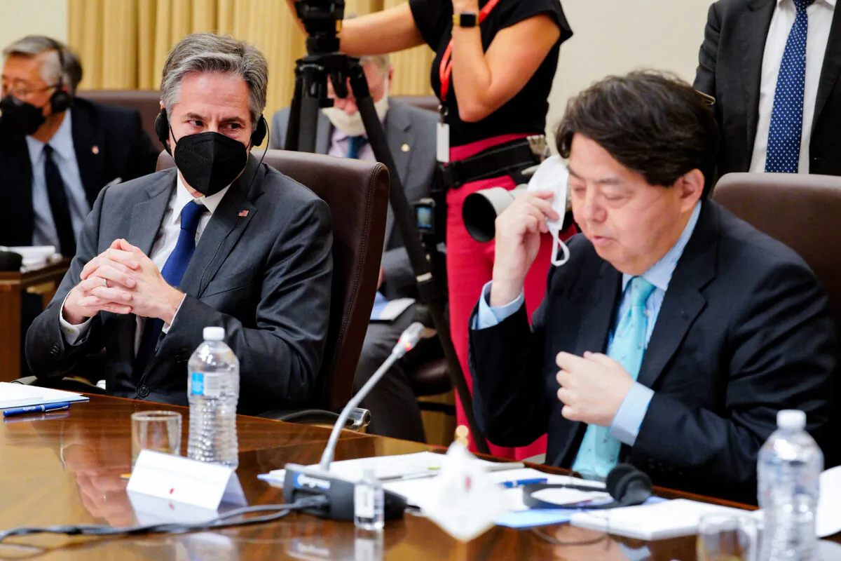 U.S. Secretary of State Antony Blinken (L) listens as Japan's Foreign Minister Yoshimasa Hayashi (R) makes opening remarks during a meeting of the Quadrilateral Security Dialogue (Quad) foreign ministers in Melbourne on February 11, 2022. (Photo by Sandra Sanders/POOL/AFP via Getty Images)