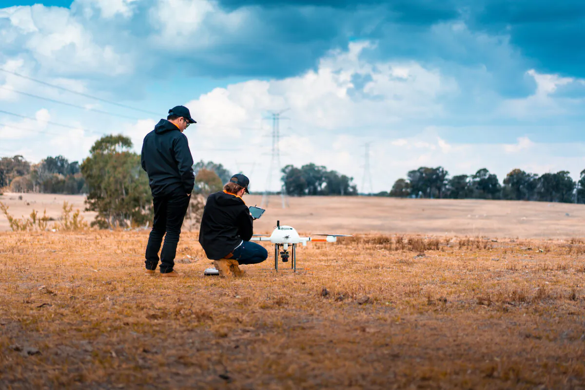 A image shows the team from Sphere Drones carrying out trials for autonomous drones in Wagga Wagga, NSW, Aug. 23, 2022. (AAP Image/Supplied by Paris Cockinos)
