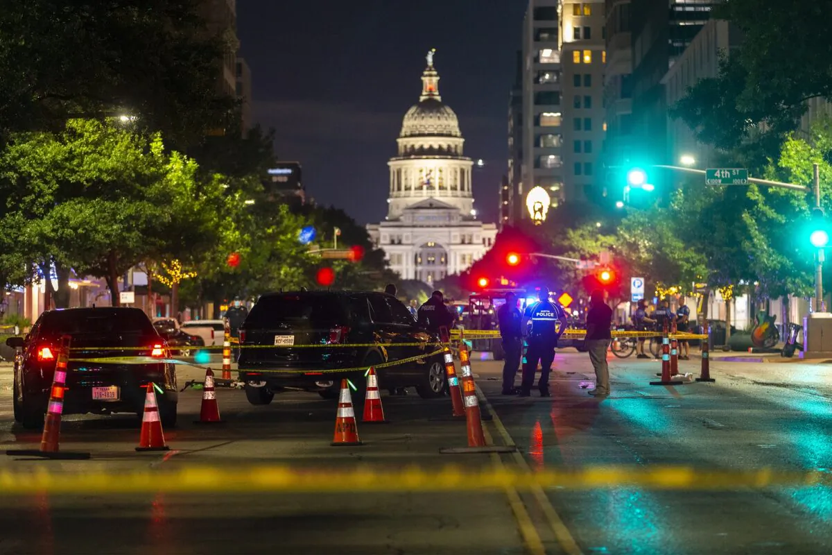 Austin Police investigate a homicide shooting that occurred at a demonstration in Austin, Texas, on July 25, 2020. (Stephen Spillman/Austin American-Statesman via AP)