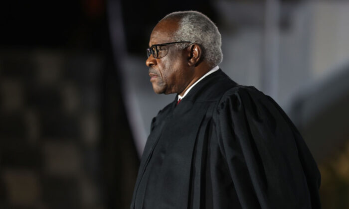 Supreme Court Associate Justice Clarence Thomas attends the ceremonial swearing-in ceremony for Amy Coney Barrett to be the U.S. Supreme Court Associate Justice on the South Lawn of the White House in Washington on Oct. 26, 2020. (Tasos Katopodis/Getty Images)