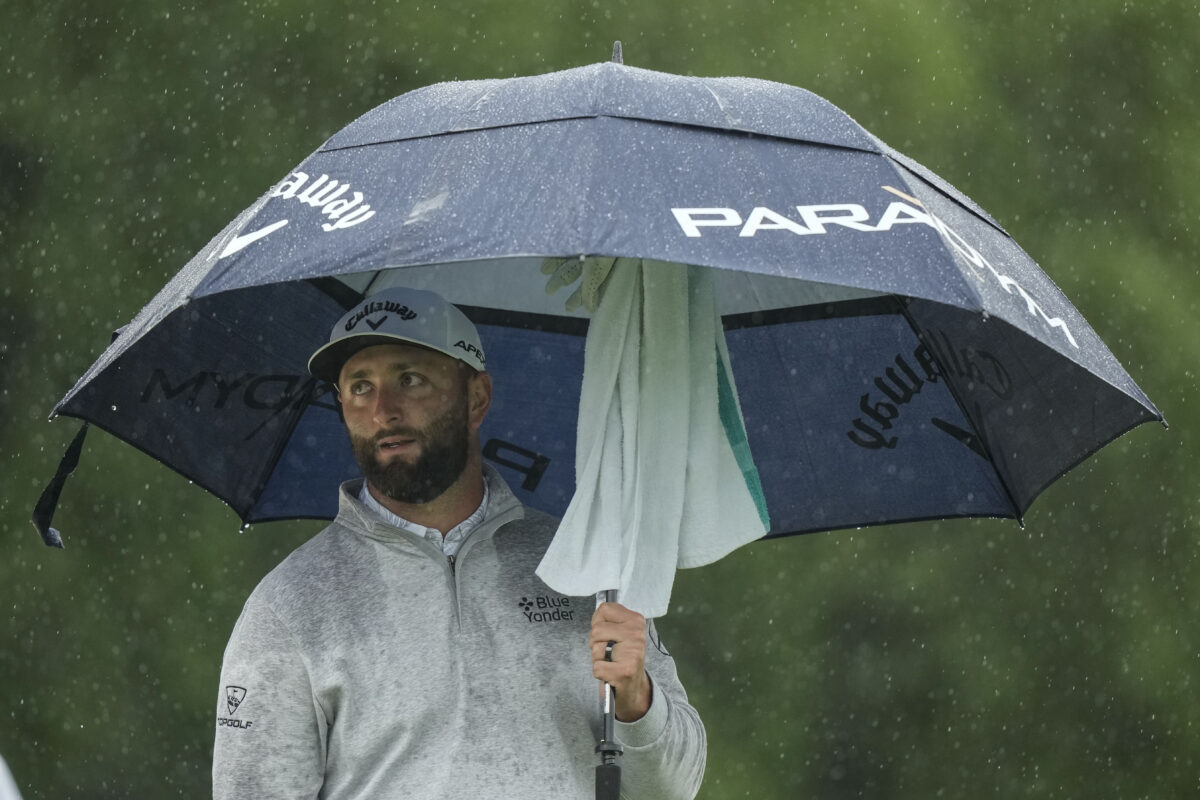 NextImg:Survival at Masters as Rahm Stays Close and Woods Makes Cut—Round 3 Suspended