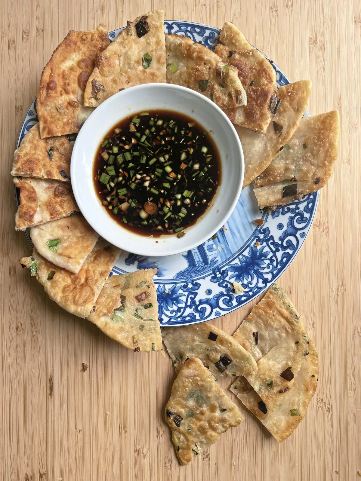 Three-ingredient scallion pancakes have a crispy shell and soft interior. (Gretchen McKay/Pittsburgh Post-Gazette/TNS)