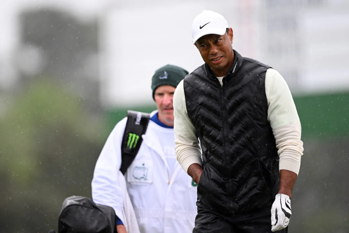 Tiger Woods of the United States looks on from the 18th green during the continuation of the weather delayed second round of the 2023 Masters Tournament at Augusta National Golf Club in Augusta, Ga., on April 8, 2023. (Ross Kinnaird/Getty Images)