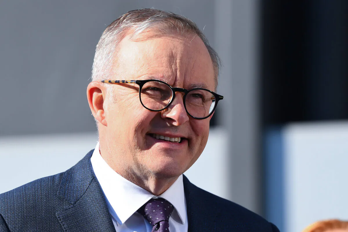 Australian Prime Minister Anthony Albanese visits Tritium in Brisbane, Australia, on March 31, 2023. (AAP Image/Jono Searle)