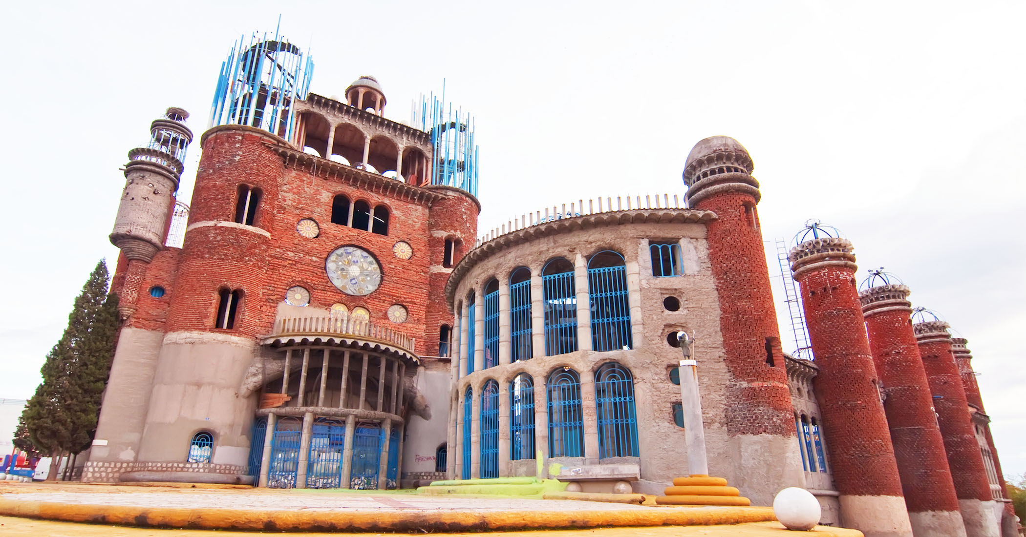 NextImg:'God’s crazy bricklayer': This man spent his life building a cathedral by hand—check out the interiors