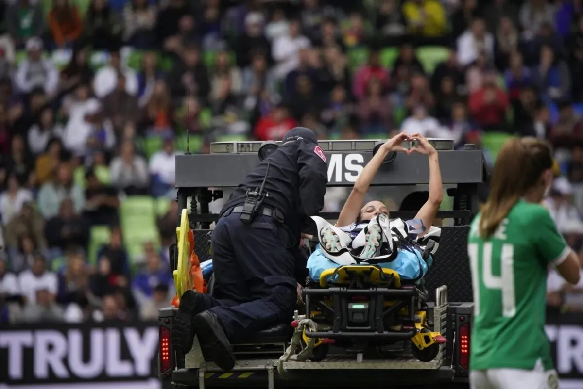 U.S. Women's National Team forward Mallory Swanson (9) is escorted off field by medical personnel during the first half in a match against the Republic of Ireland Women's National Team at Q2 Stadium in Austin, Texas, on April 8, 2023. (Dustin Safranek/USA TODAY Sports via Field Level Media)