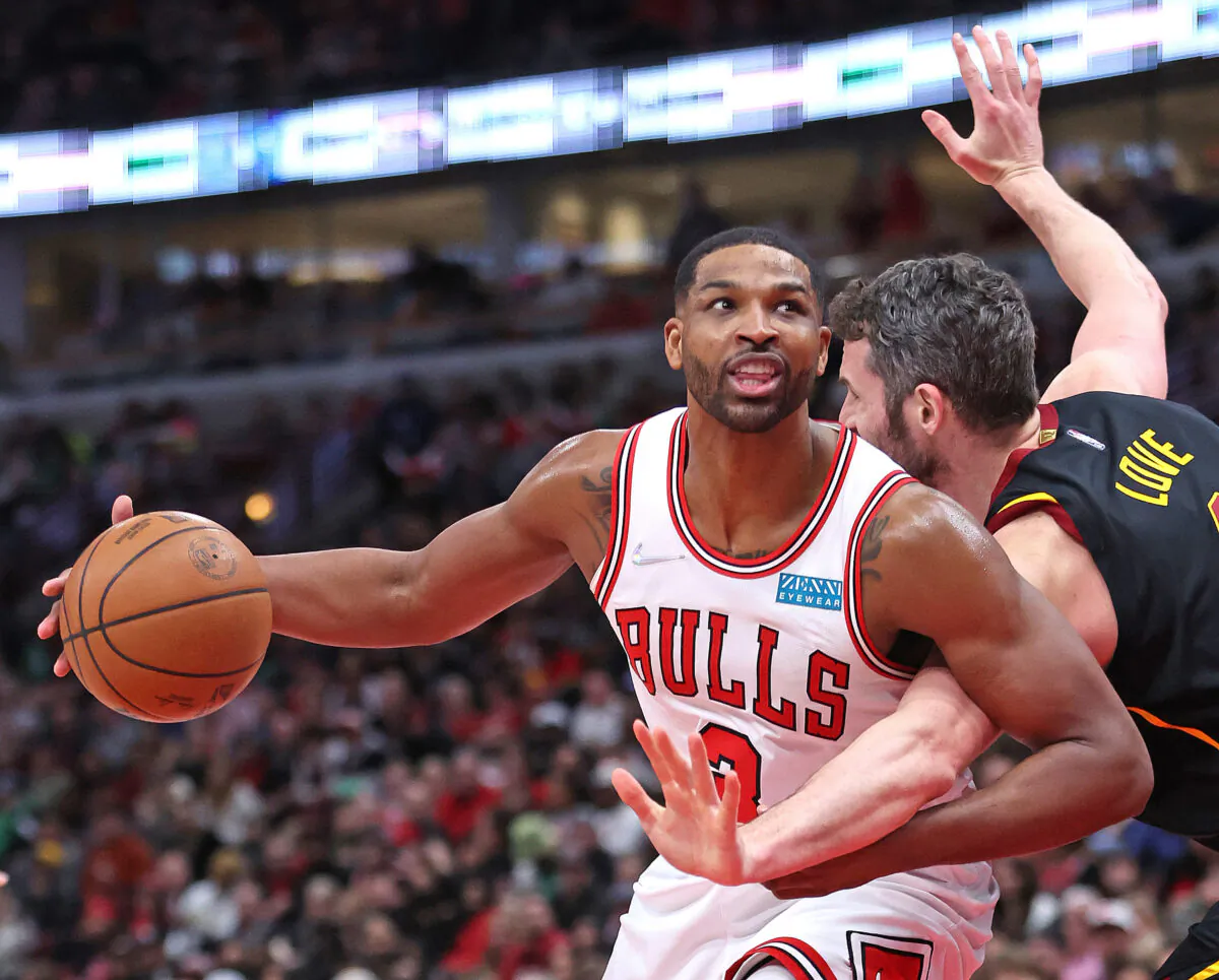 Tristan Thompson (3) of the Chicago Bulls is fouled by Kevin Love (0) of the Cleveland Cavaliers at the United Center in Chicago on March 12, 2022. (Jonathan Daniel/Getty Images)