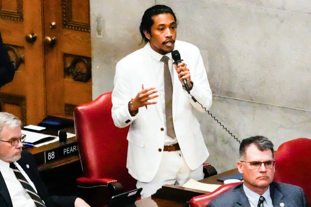 Rep. Justin Jones, D-Nashville, delivers remarks on the floor of the House chamber Thursday, April 6, 2023, in Nashville, Tenn. Tennessee Republicans are seeking to oust Jones and two other House Democrats for their role in a demonstration calling for gun control following the Nashville school shooting.(AP Photo/George Walker IV)