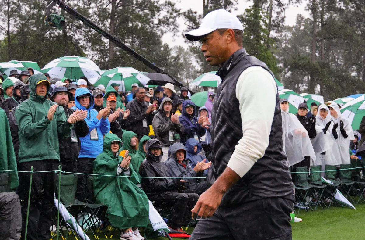 Tiger Woods of the United States walks off the 18th green after completing his second round of the Masters golf tournament at Augusta National Golf Club in Augusta, Ga., on April 8, 2023. (Brian Snyder/Reuters)