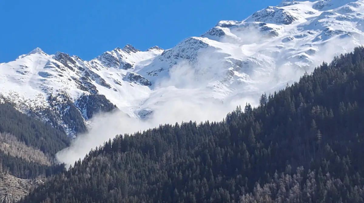 An avalanche in the French Alps, in Les Contamines-Montjoie, France, on April 9, 2023, in this still image obtained from a social media video. (Domaine Skiable des Contamines-Montjoie SECMH/Twitter @domaineskiable via Reuters)