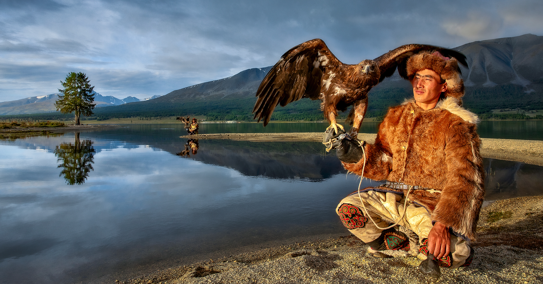 NextImg:Mongolian hunters and their golden eagles: Magnificent photos of this living heritage