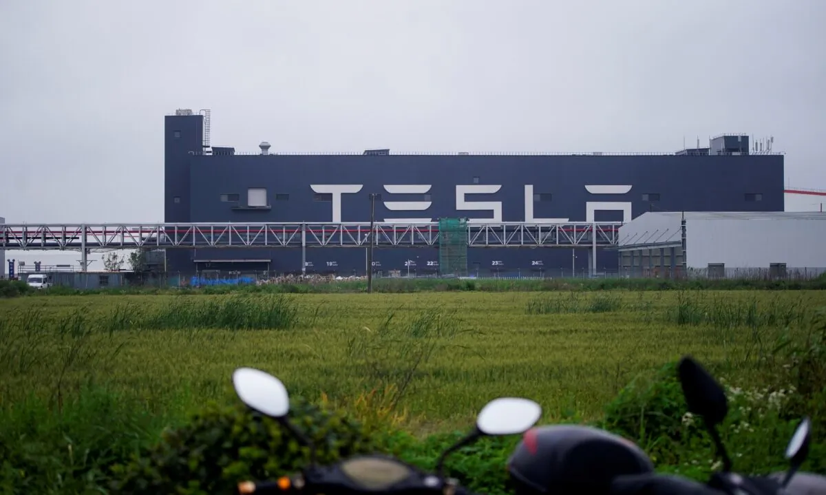 A Tesla sign at its factory in Shanghai on May 13, 2021. (Aly Song/Reuters)
