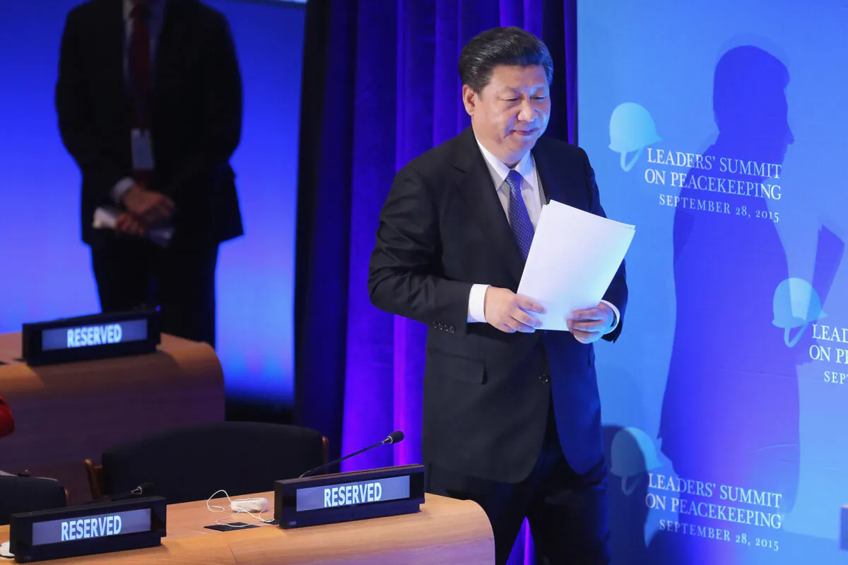 Chinese leader Xi Jinping prepares to address the Leaders' Summit on Peacekeeping at the 70th annual UN General Assembly at the UN headquarters in New York on Sept. 28, 2015. (Chip Somodevilla/Getty Images)