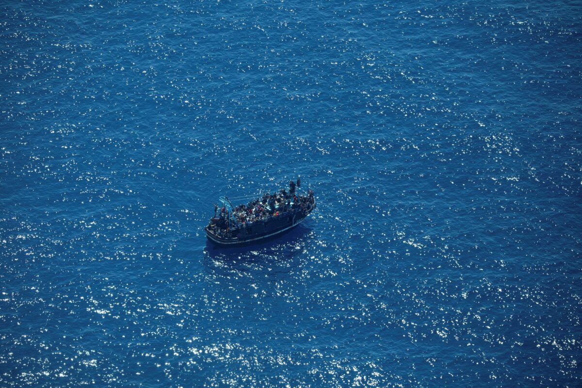 NextImg:Italy's Coastguard Works to Rescue 1,200 Migrants Drifting at Sea