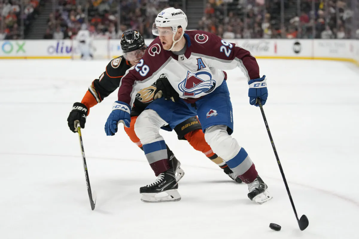 Colorado Avalanche center Nathan MacKinnon carries the puck against the Anaheim Ducks in Anaheim, Calif., on April 9, 2023. (Ashley Landis/AP Photo)