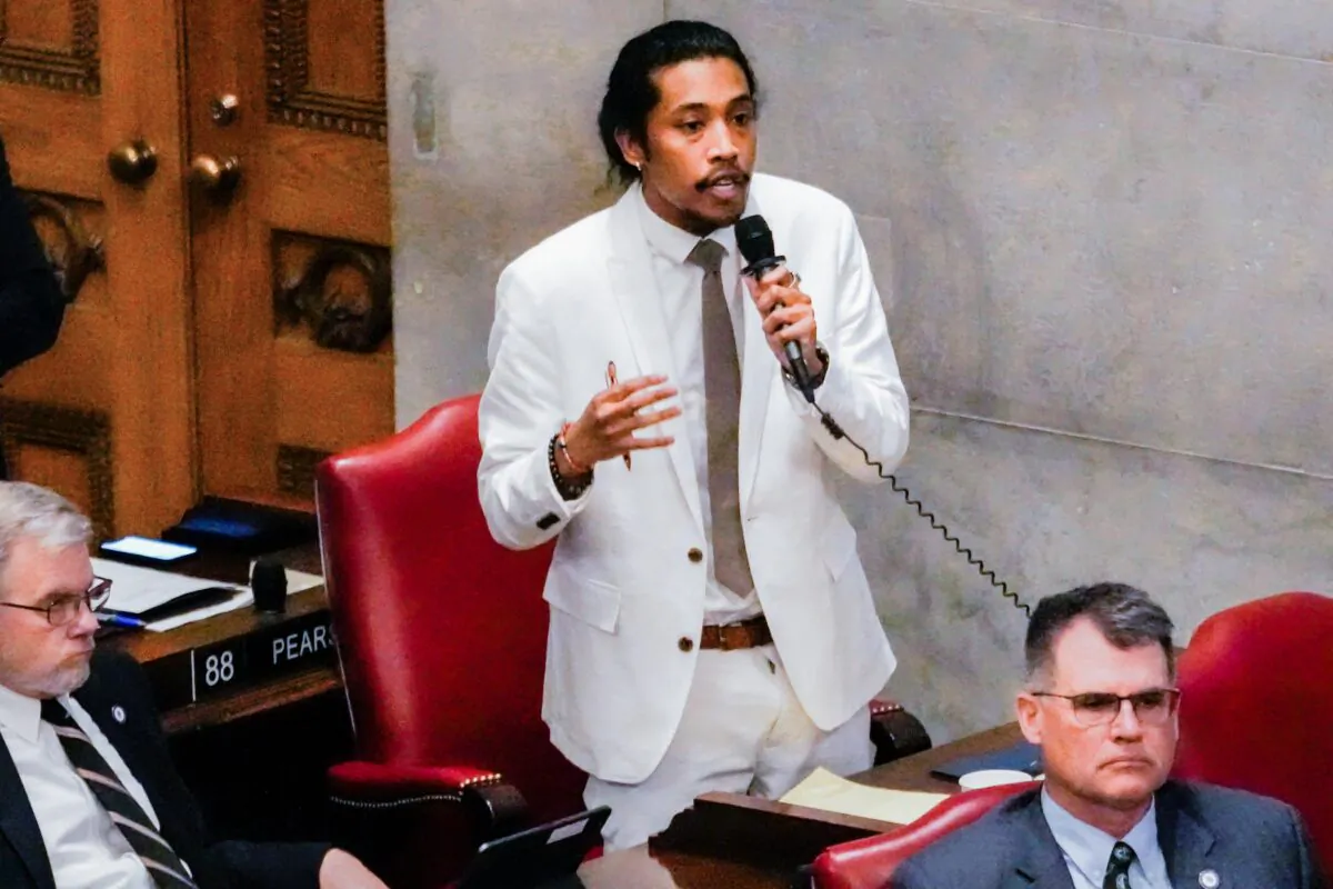 Rep. Justin Jones, D-Nashville, delivers remarks on the floor of the House chamber Thursday, April 6, 2023, in Nashville, Tenn. Tennessee Republicans are seeking to oust Jones and two other House Democrats for their role in a demonstration calling for gun control following the Nashville school shooting.(AP Photo/George Walker IV)