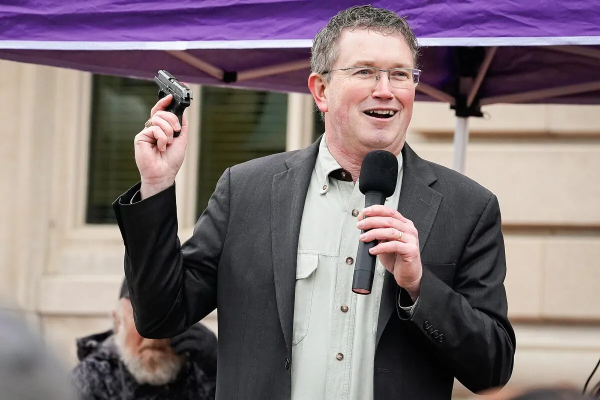 FRANKFORT, KY - JANUARY 31: Rep Thomas Massie (R-KY) draws a Ruger LCP handgun from his pocket during a rally in support of the Second Amendment on January 31, 2020 in Frankfort, Kentucky. Advocates from across the state gathered at the Kentucky Capitol in support of the Second Amendment. The rally will include speeches from Rep. Thomas Massie (R-KY) and former Washington, D.C. Special Police Officer, Dick Heller. (Photo by Bryan Woolston/Getty Images)