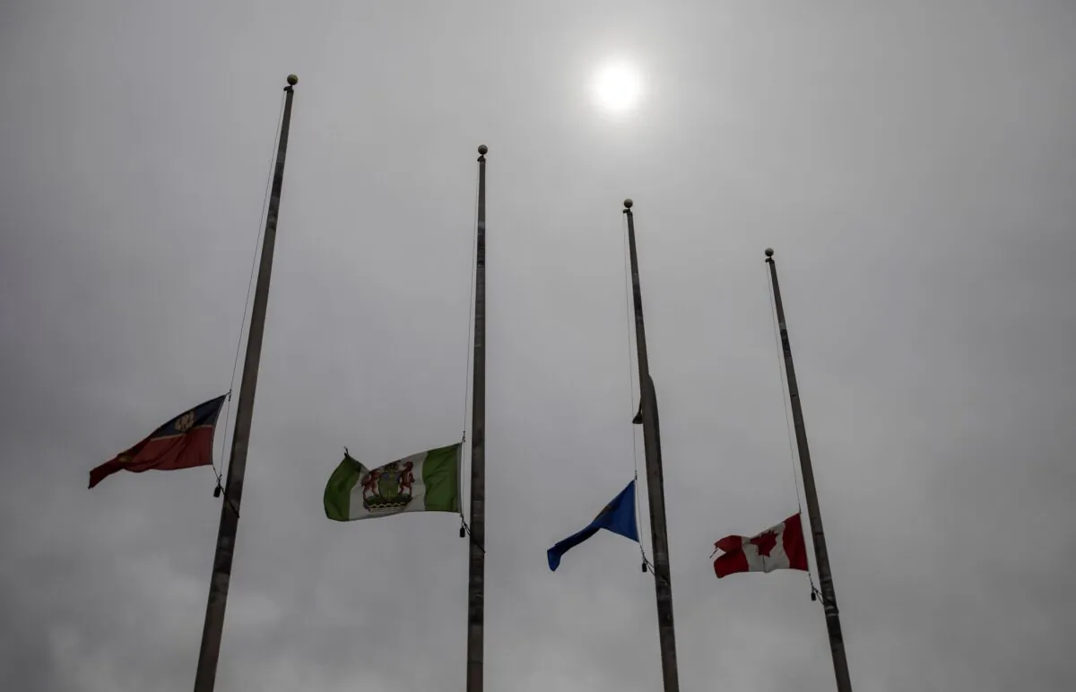 Flags at half mast for RCMP constable Harvinder Singh Dhami who was killed in a car accident on the way to a call, in Sherwood Park, Alta., on April 10, 2023. (The Canadian Press/Jason Franson)
