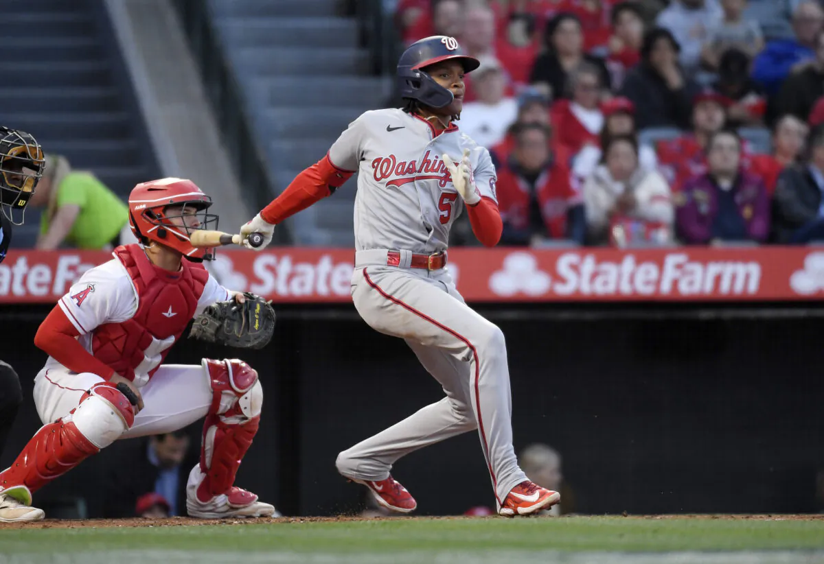 CJ Abrams (5) of the Washington Nationals hits an RBI single against the Los Angeles Angels during the second inning at Angel Stadium of Anaheim in Anaheim, Calif., on April 10, 2023. (Kevork Djansezian/Getty Images)