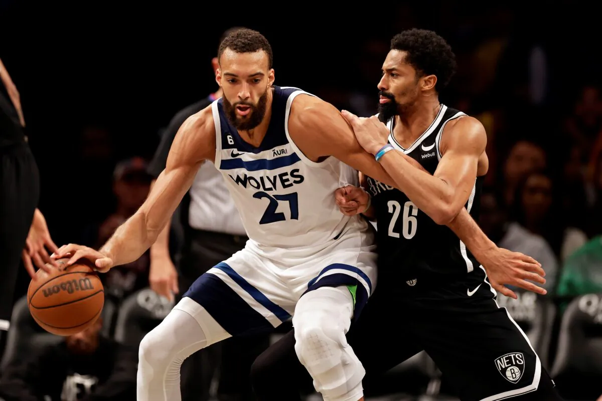 Minnesota Timberwolves center Rudy Gobert (27) drives to the basket against Brooklyn Nets guard Spencer Dinwiddie during the second half of an NBA basketball game in New York on April 4, 2023. (Adam Hunger/AP Photo)