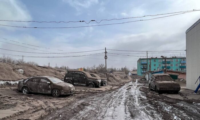 Cars covered in volcanic dust following the eruption of Shiveluch volcano in the settlement of Klyuchi on the Kamchatka Peninsula, Russia, on April 11, 2023. (Official page of Oleg Bondarenko, Head of the Ust-Kamchatsky municipal district/Handout via Reuters)