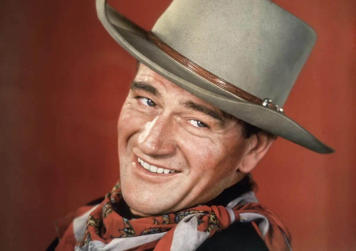 Studio portrait of American actor
John Wayne wearing his signature
cowboy hat and neckerchief, circa 1955. (Hulton Archive/Stringer/Archive Photos/Getty Images)