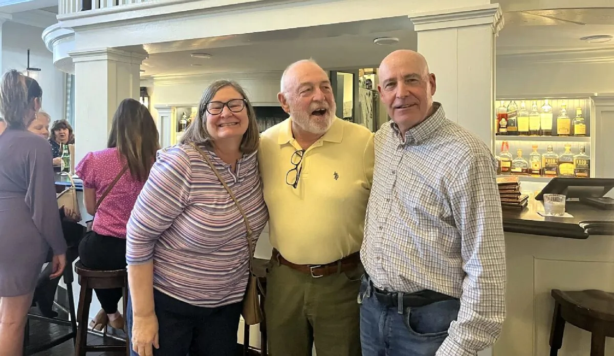 Christopher Ege (C), from Englewood, New Jersey, stands next to by JoAnn and Dan Harrison, of Annapolis, Maryland, at the Bedford Springs Hotel. (Salena Zito)