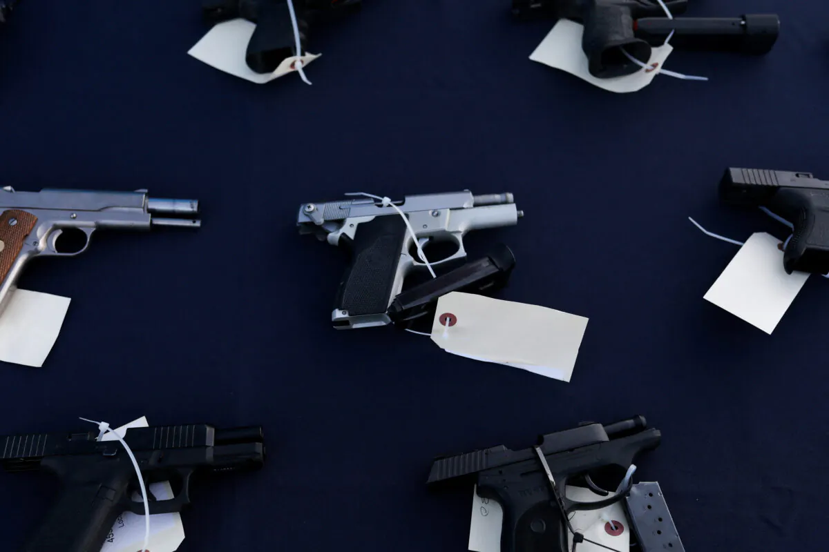 Firearms confiscated at the Windsor border are displayed at the Canada Border Services Agency (CBSA) point of entry at the Ambassador Bridge in Windsor, Ontario, on June 28, 2022. (Emily Elconin/Reuters)