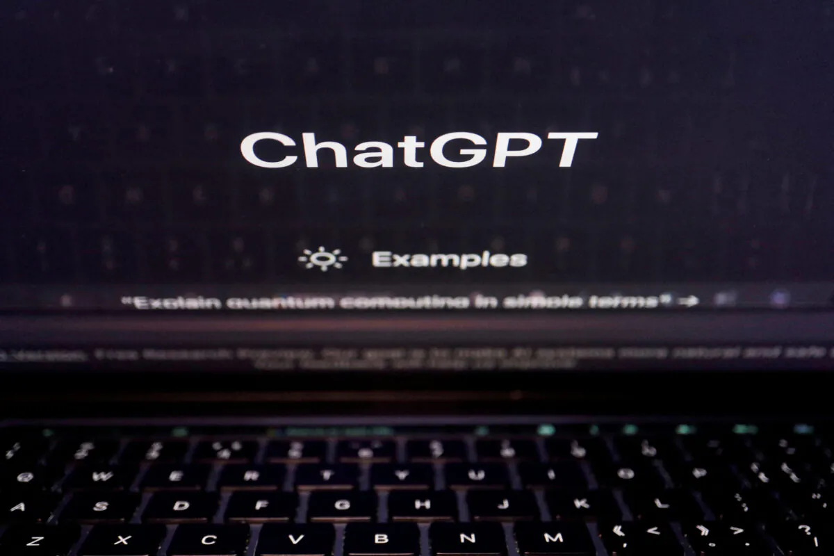 A keyboard is seen reflected on a computer screen displaying the website of ChatGPT, an AI chatbot from OpenAI, in this illustration picture taken on Feb. 8, 2023. (Florence Lo/Reuters)