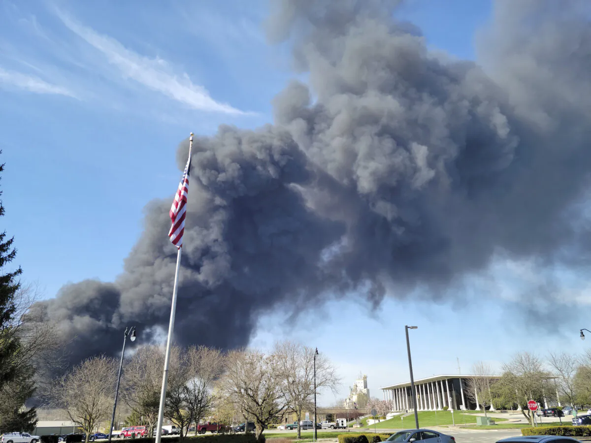 Smoke rises from an industrial fire at 358 NW F Street, in Richmond, Ind., on April 11, 2023. (Zach Piatt/The Palladium-Item via AP)