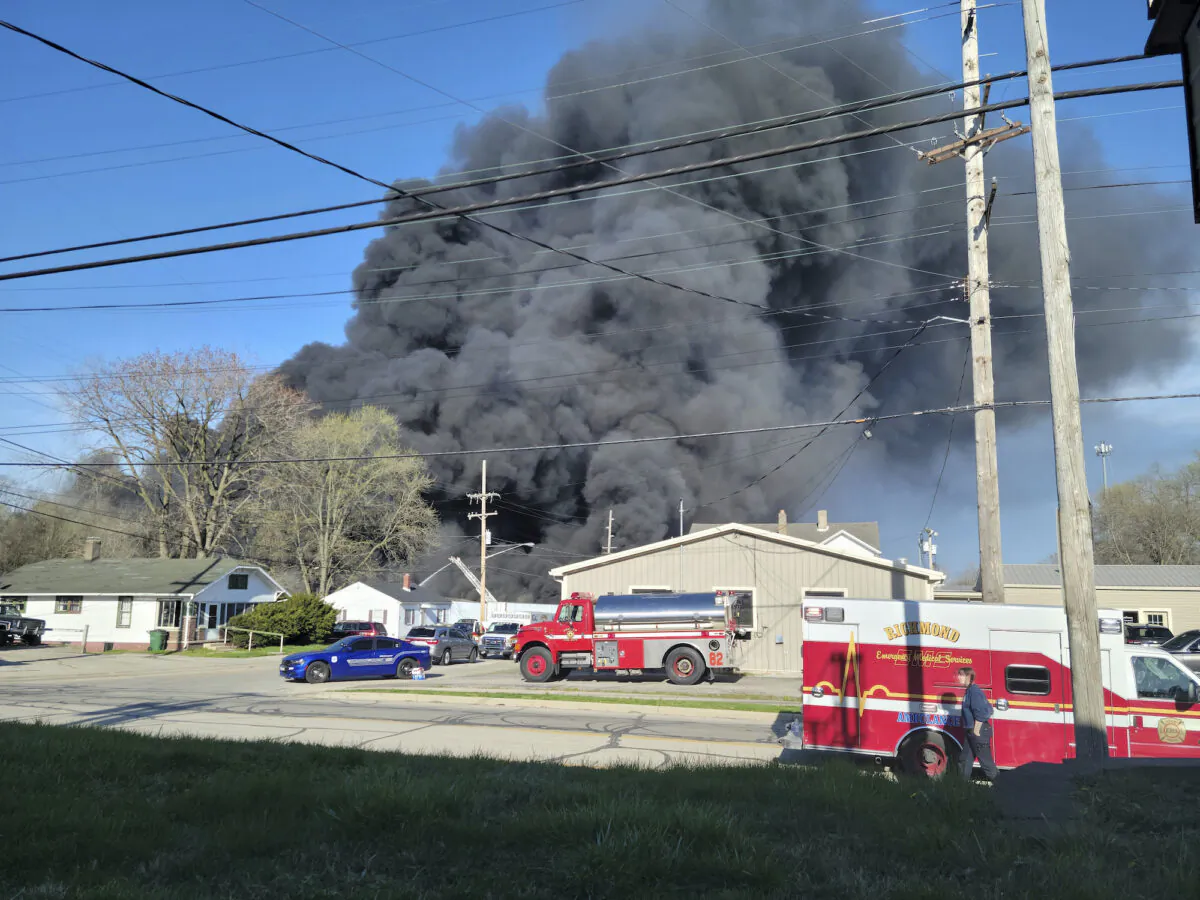 Smoke rises from an industrial fire at 358 NW F Street, in Richmond, Ind., on April 11, 2023. (Zach Piatt/The Palladium-Item via AP)