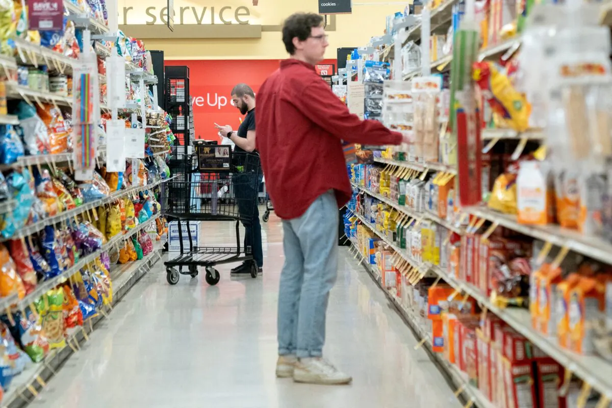 Shoppers look at items displayed at a grocery store in Washington, on Feb. 15, 2023. (Stefani Reynolds/AFP via Getty Images)