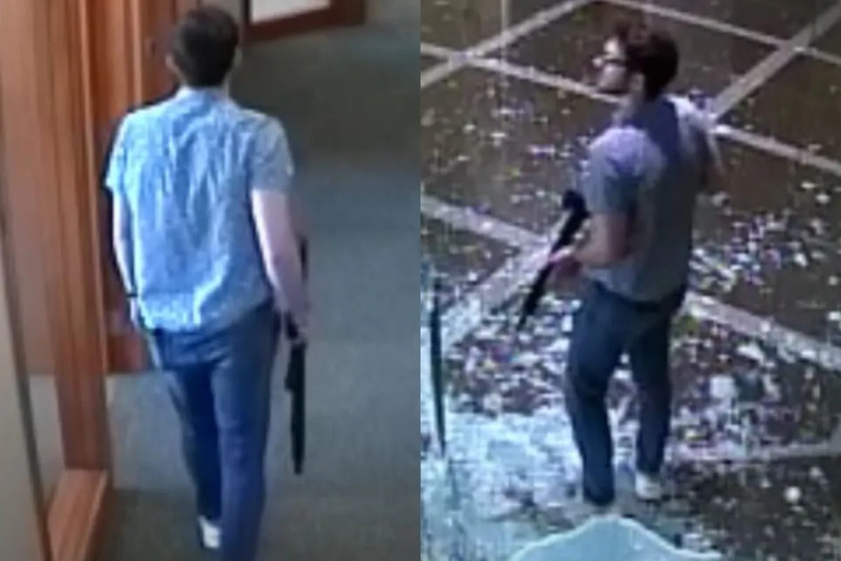 In images from video, Connor Sturgeon stands inside Old National Bank in Louisville, Ky., on April 10, 2023. (Louisville Metro Police Department via The Epoch Times)