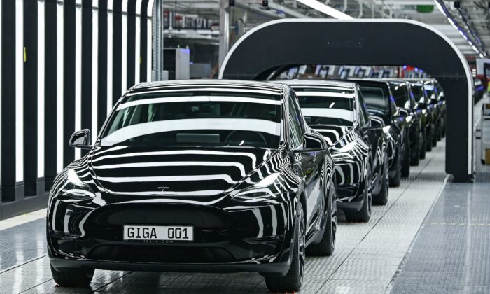 A line of electric vehicles of the model Y during the start of the production at Tesla's "Gigafactory" in Gruenheide, southeast of Berlin on March 22, 2022. (Patrick Pleul/Pool/AFP via Getty Images)