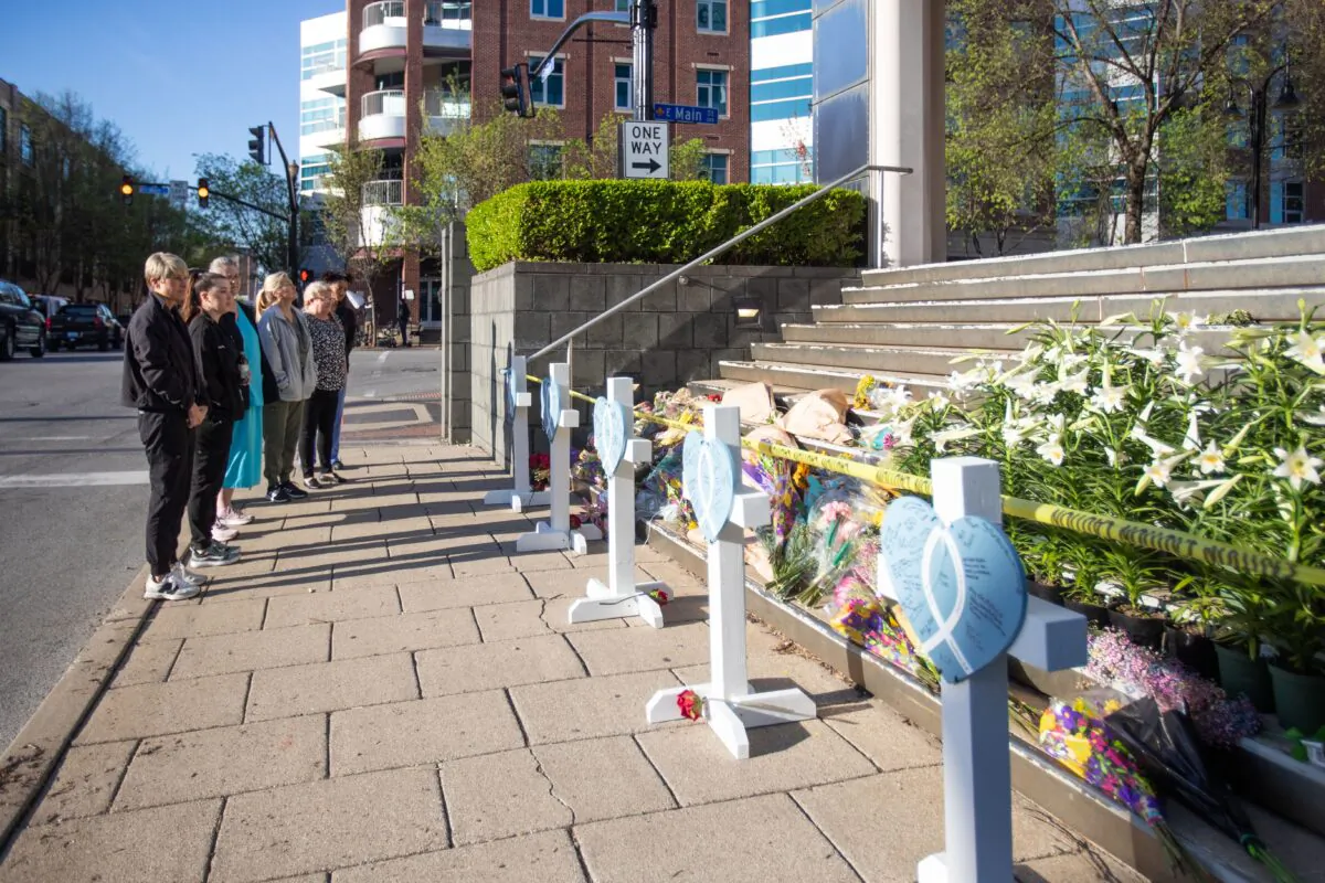 A makeshift memorial set up on the steps of the Old National Bank in Louisville, Ky., on April 12, 2023. (Leandro Lozada/AFP via Getty Images)