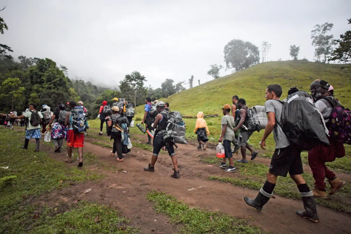 Haitian migrants cross the jungle of the Darien Gap, near Acandi, Choco department, Colombia, heading to Panama, on Sept. 26, 2021, on their way trying to reach the United States. (Raul Arboleda/AFP via Getty Images)